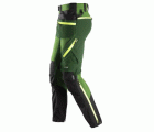 6940 Pantalones largos de trabajo elásticos FlexiWork Softshell Slim Fit bolsillos flotantes verde manzana/ verde bosque